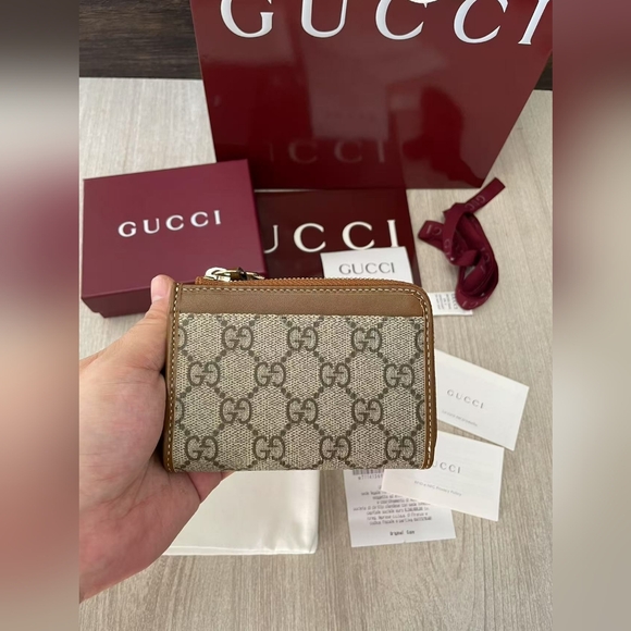 Gucci Handbags - Gucci GG Emblem zip card case
